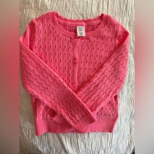 Pink button-down sweater cardigan. Size 4, Never worn.